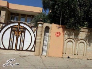 Christian homes in Mosul marked by the Islamic State with a red Arabic letter "N" - for "Nazarene."